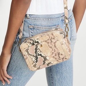 Madewell snakeskin camera transport bag.